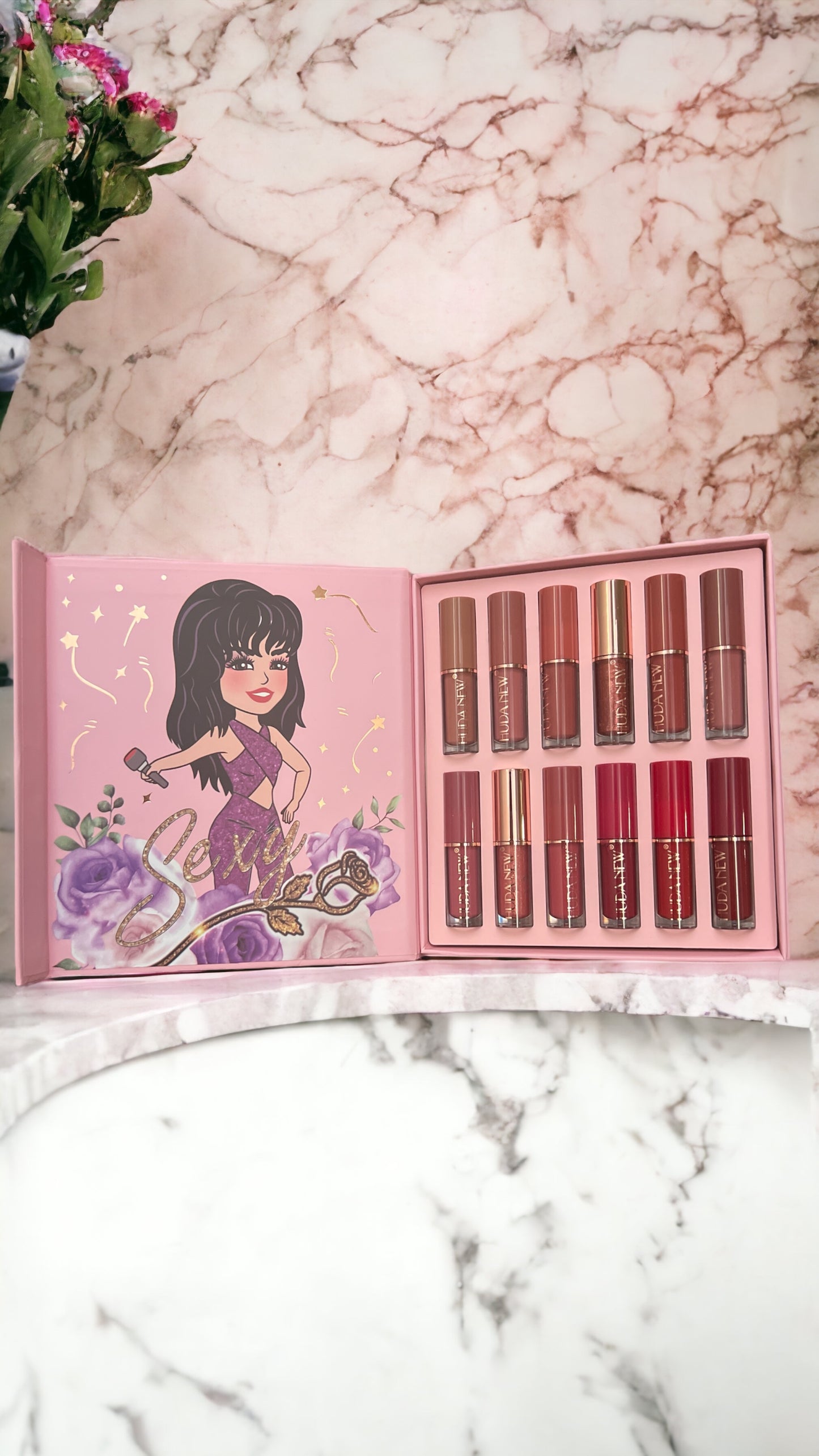 Caja de brillo labial rosa de Selena