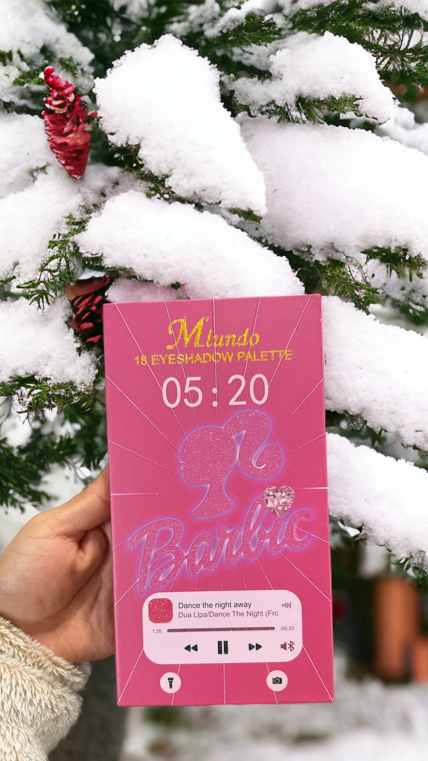 Barbie con sombras de ojos con purpurina